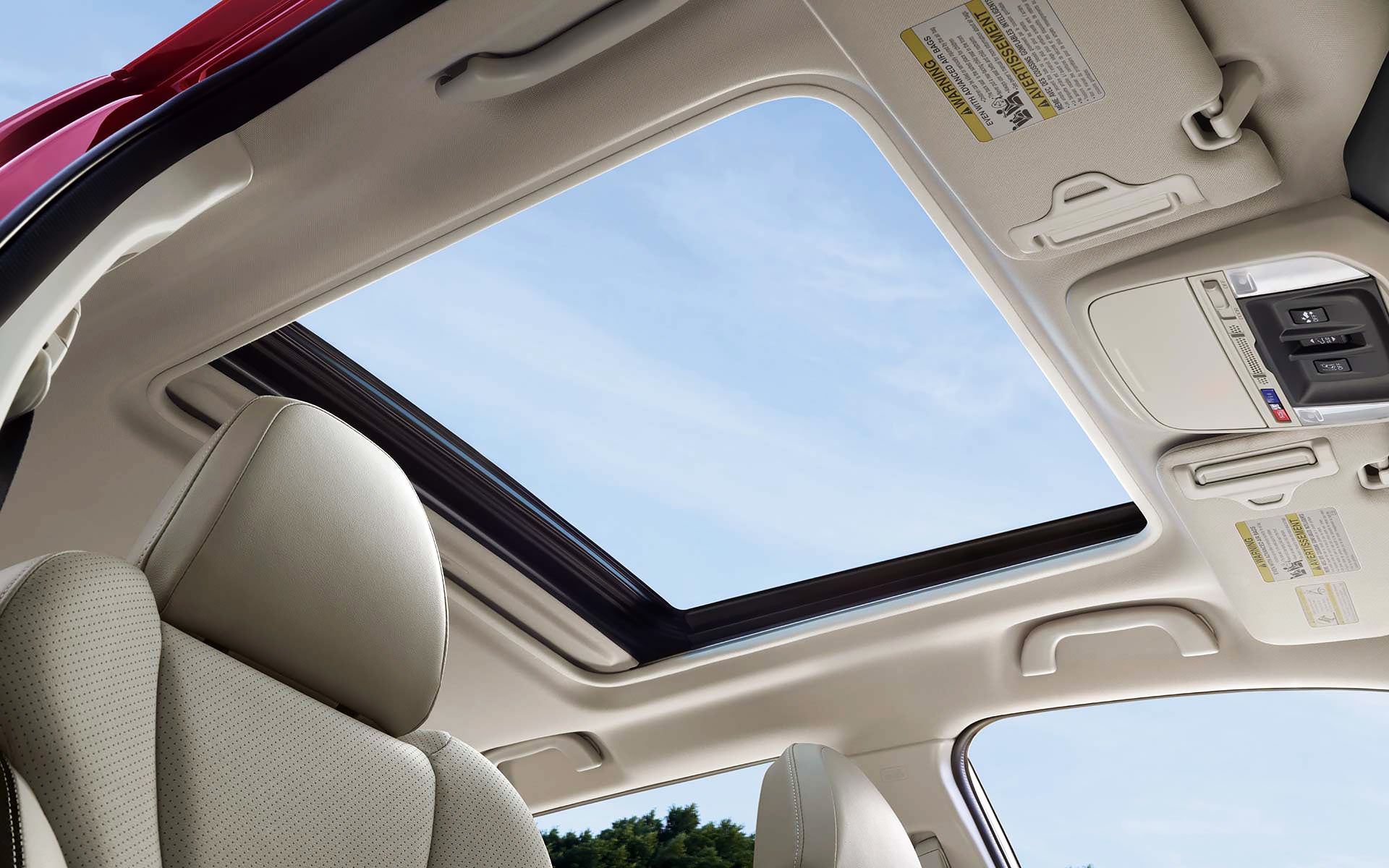 A view through the power sliding panoramic moonroof on the 2022 Forester Sport. | Open Road Subaru in Union NJ